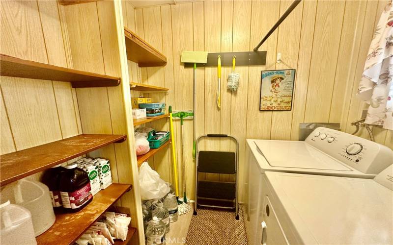 laundry room with additional storage