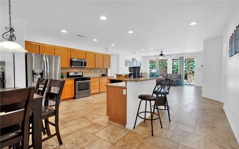 Open floor plan with lots of natural light and upgraded with tile flooring.