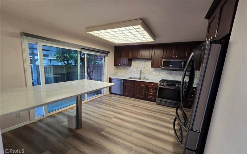 Slider Leads to Spacious Covered Patio