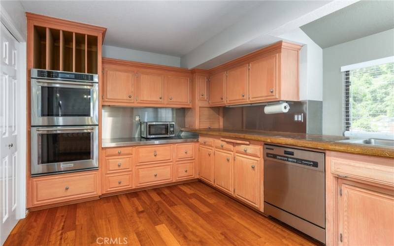 The massive kitchen is a dream for cooking large meals with the double ovens and open countertops.