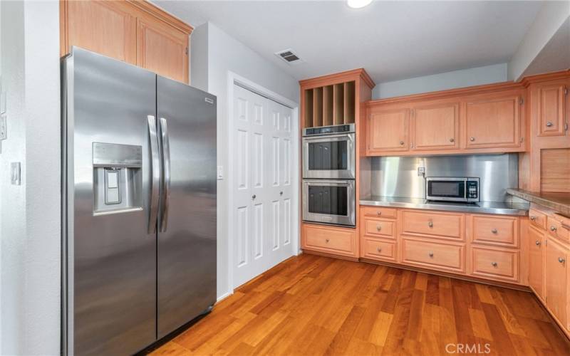 The kitchen offers a walk in pantry for even more storage.