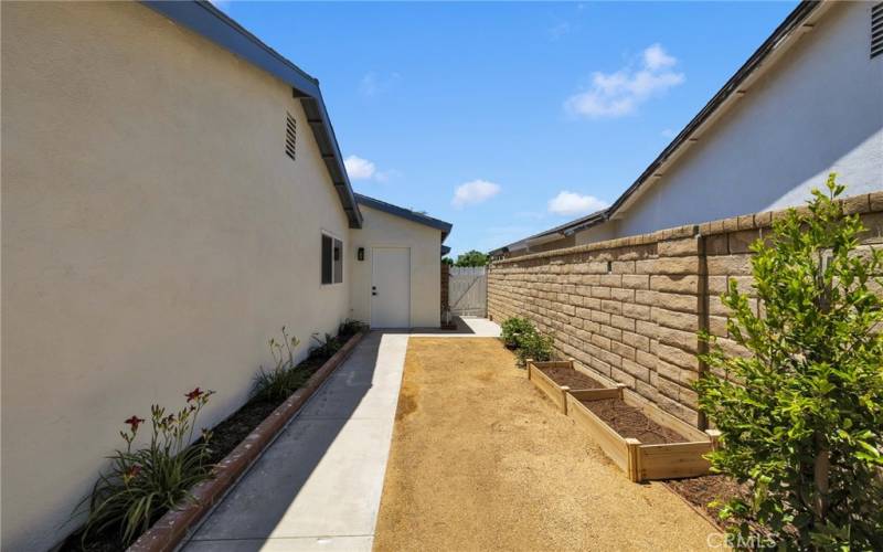 Side Yard with Planter Bed and Garden Space