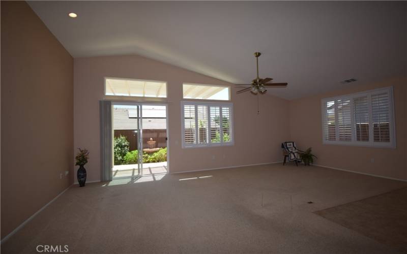 Great Room looking through patio door to fountain