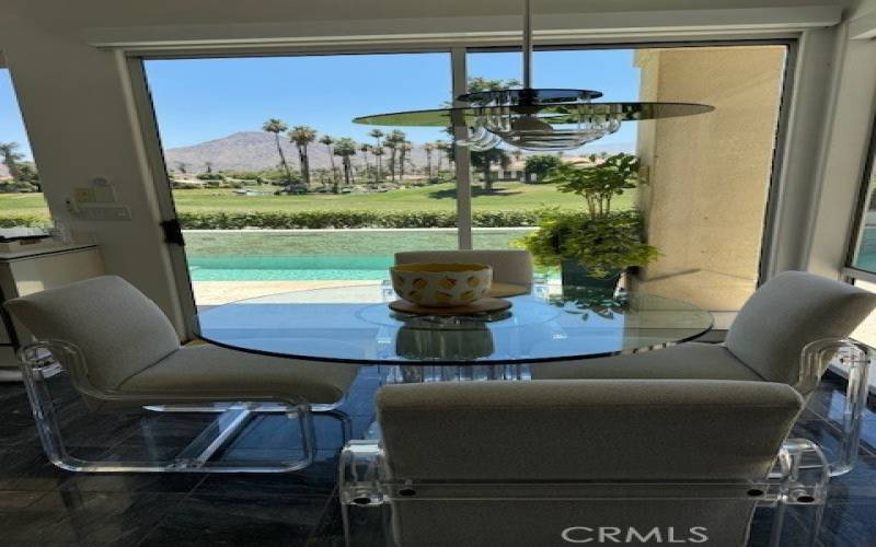 Breakfast nook overlooking pool and golf course