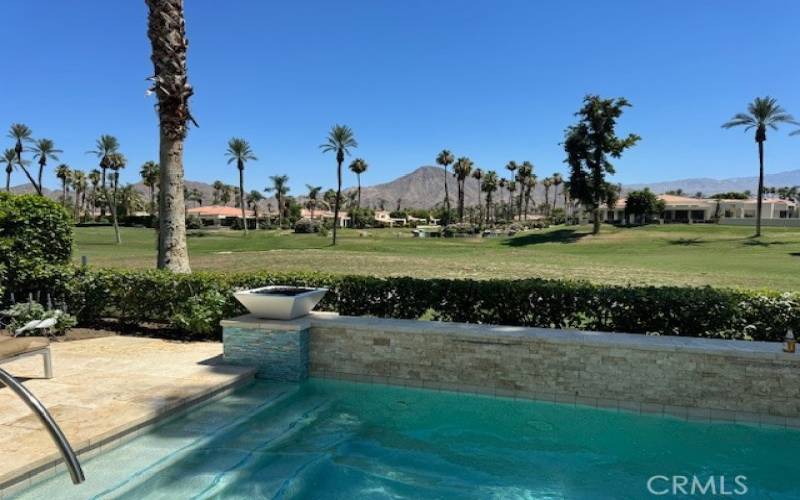 Pool with view of golf course