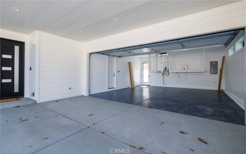 Direct access garage with finished floors