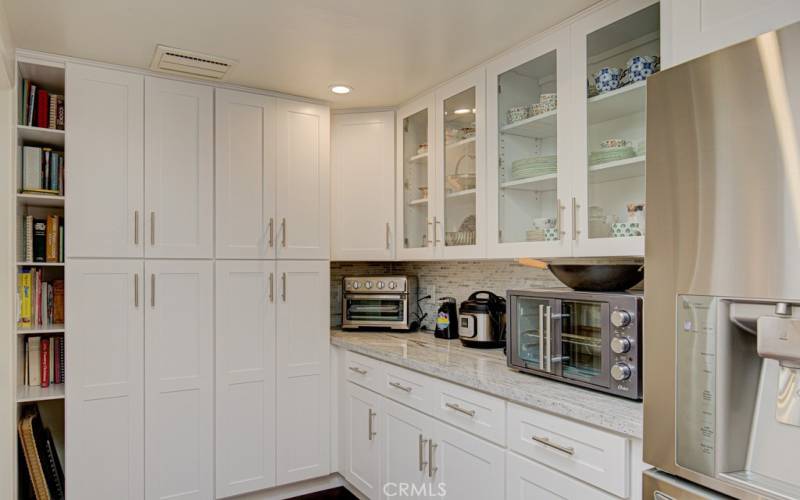 Expanded area of the kitchen provides more storage capacity.