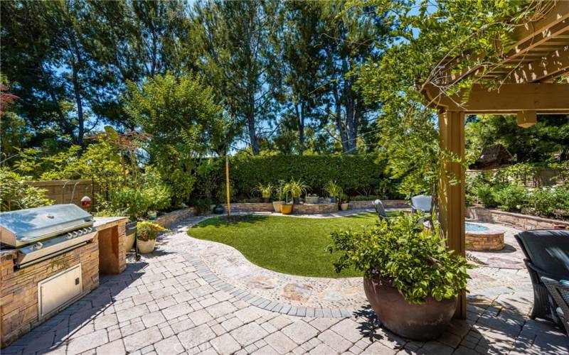 a remarkable yard, lushly landscaped
