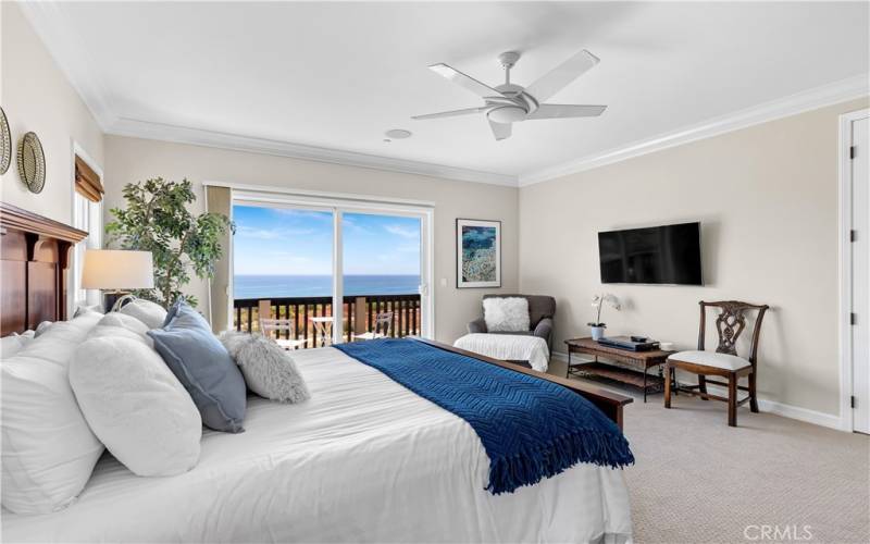 Wake up to the sight and smell of the ocean from the primary bedroom en-suite complete with breathtaking views and a private balcony.