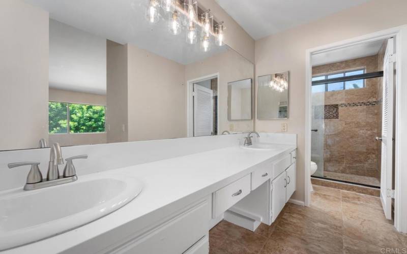Large master bathroom. Hi and her sinks with oversized shower