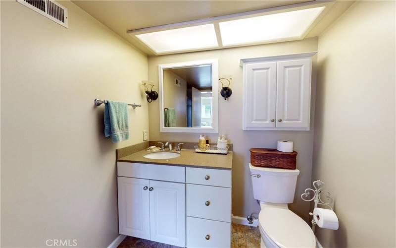 Downstairs bathroom with walk-in shower.