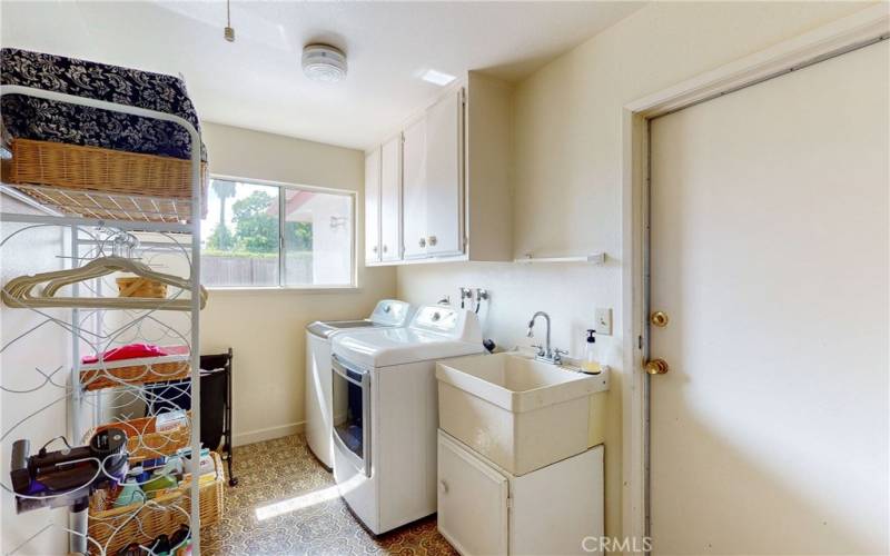 Laundry Room and garage door.