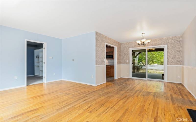 Stepping inside you are greeted by the original hardwood floors that are found in the living room, dining area and two of the three bedrooms.