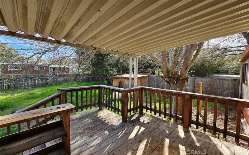 Covered back deck overlooking the grounds