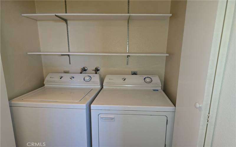 Washer and dryer closet.