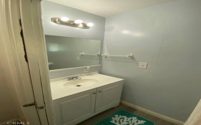 Hall bathroom with 3/4 shower.