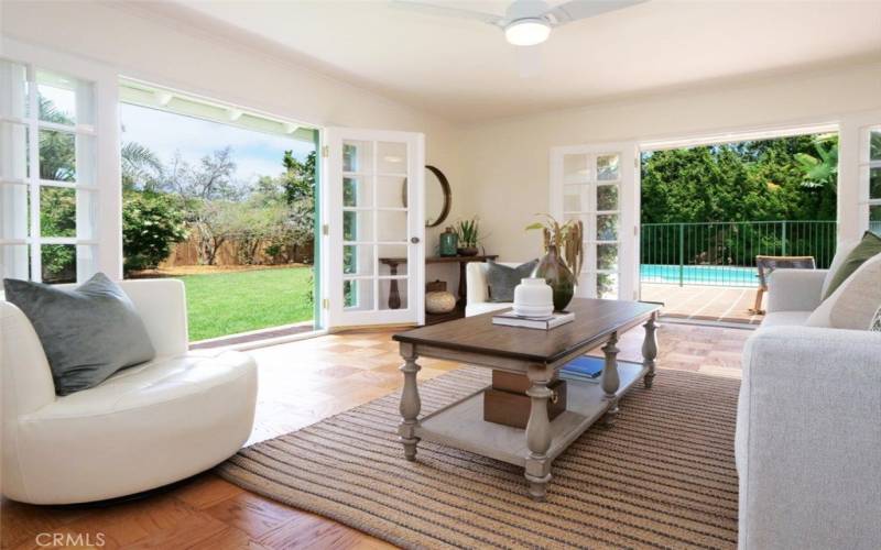 Wonderful open plan living with numerous French doors providing lots of natural light and easy egress to the big yard plus beautiful wood floors and freshly painted interior.