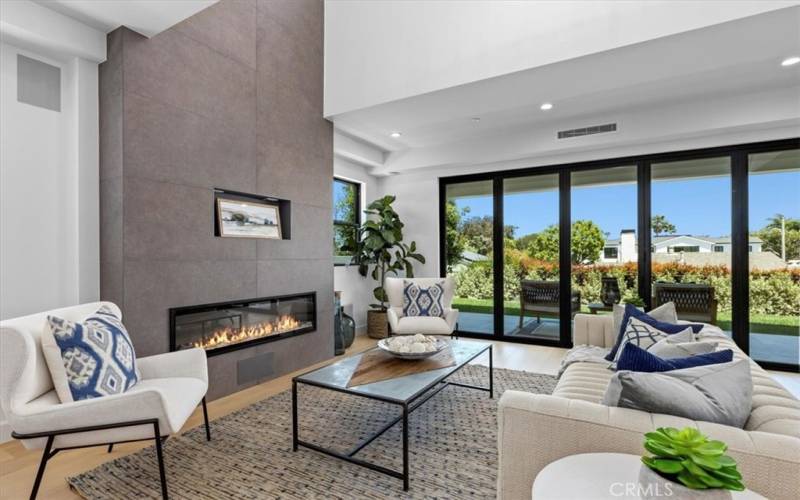 Living area with 14' folding doors to patio and backyard