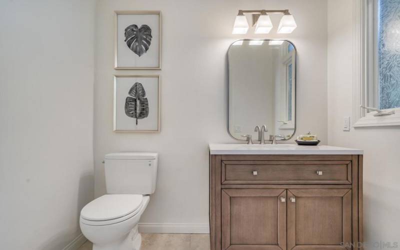 Chic Powder Room off the Foyer