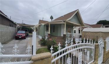 FRONT LEFT HOUSE VIEW WITH DRIVEWAY & CARPORT PARKING