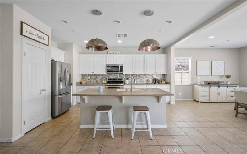 Light & bright kitchen with walk in pantry.