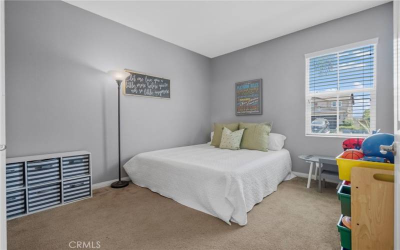 Large downstairs bedroom with a king-size bed