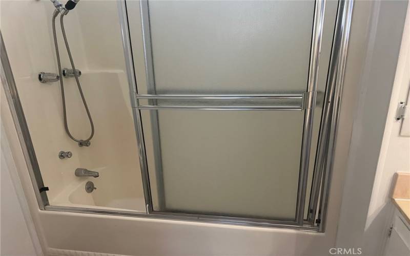 primary bathroom has a tub/shower combo