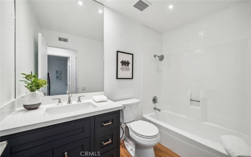 The guest bath has been remodeled as well, w/ custom, neutral finishes