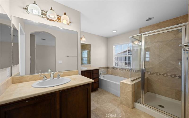 Master bath with soaking tub and separate vanities