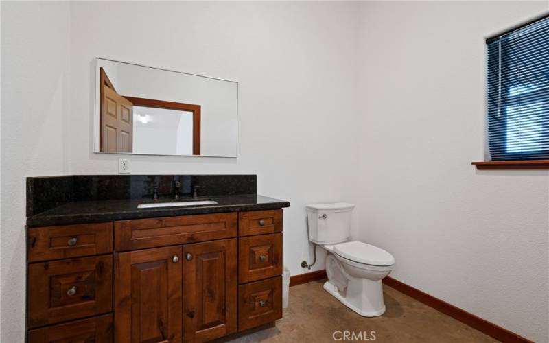 Half bath in downstairs room for possibilities