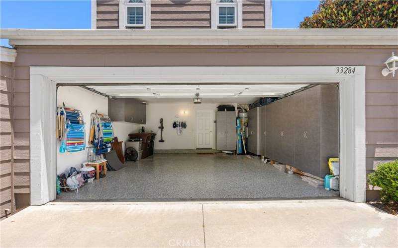Garage with epoxy flooring and built-ins