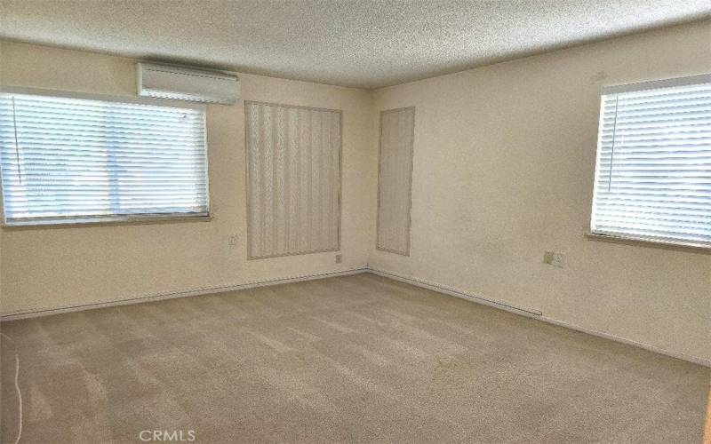 Primary bedroom with 2 windows