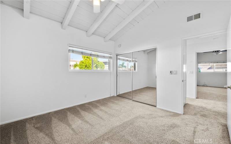 another view of the 3rd bedroom, with a great sized mirrored closet.