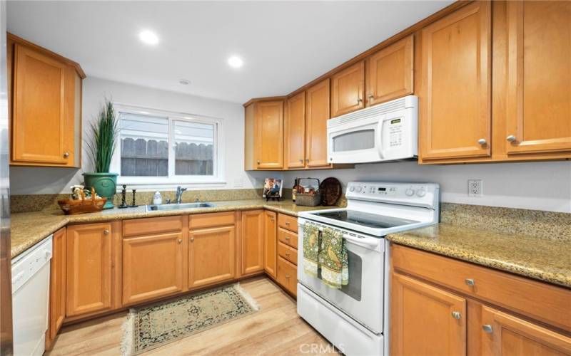 Great cabinet space and countertop space is available in this kitchen.