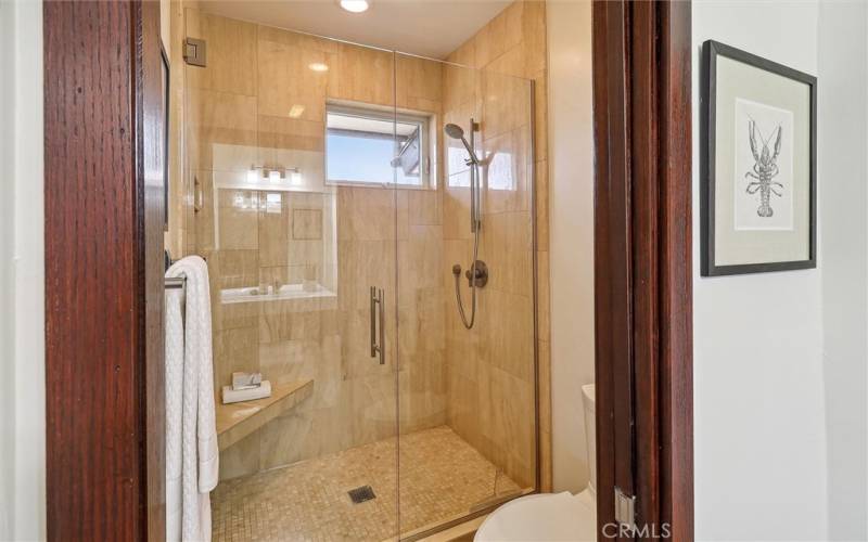 Large walk-in shower for bathroom that sits between bedrooms 3 and 4.