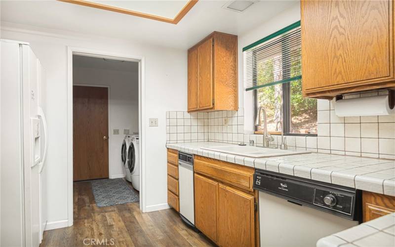 kitchen, to laundry room to garage