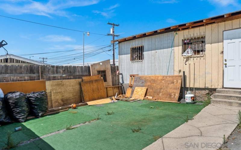 Backyard looking towards detached garage.