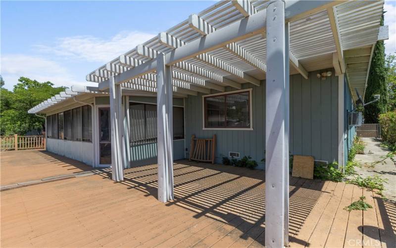 The pergola offers shade on hot days.