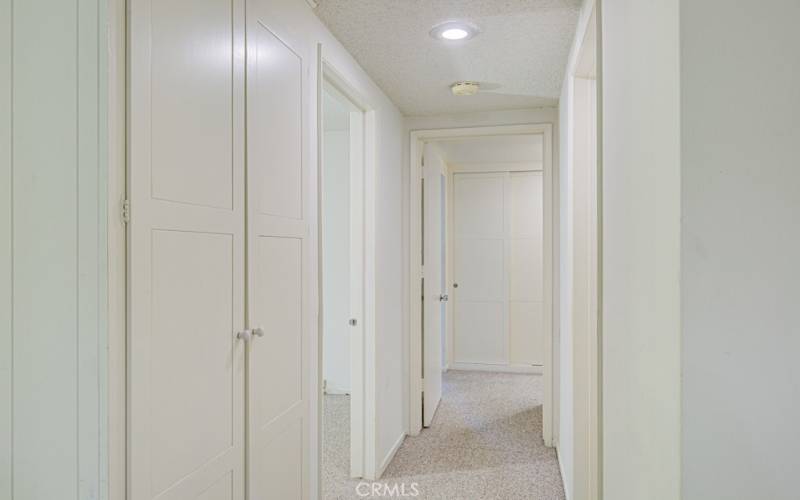 Hallway leading to the bedrooms and​​‌​​​​‌​​‌‌​​‌​​​‌‌​​​‌​​‌‌​​‌‌​​‌‌​​​​ bathrooms.