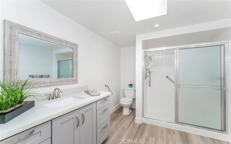 Remodeled bathroom with walk-in shower