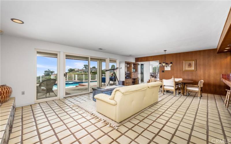 Large entertainment room overlooking pool and view of harbor