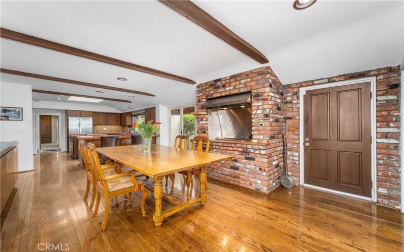 Entertainers kitchen with indoor grill and seating area