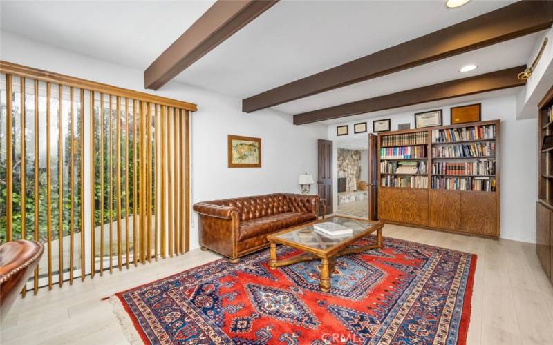 Library/Office/Den with beams and sliding door