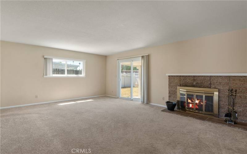 LARGE LIVING ROOM WITH NICE FIREPLACE