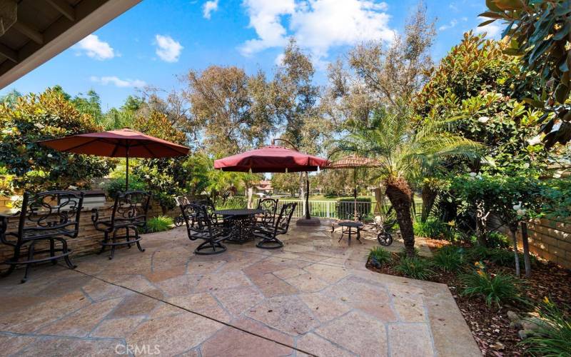 Step outside to a beautiful stone patio  floor.