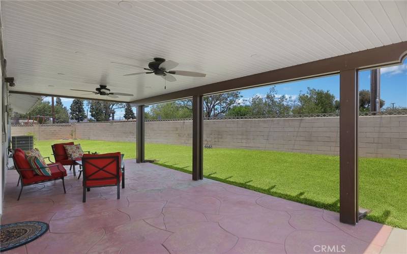 Covered patio with recessed lights and ceiling fan