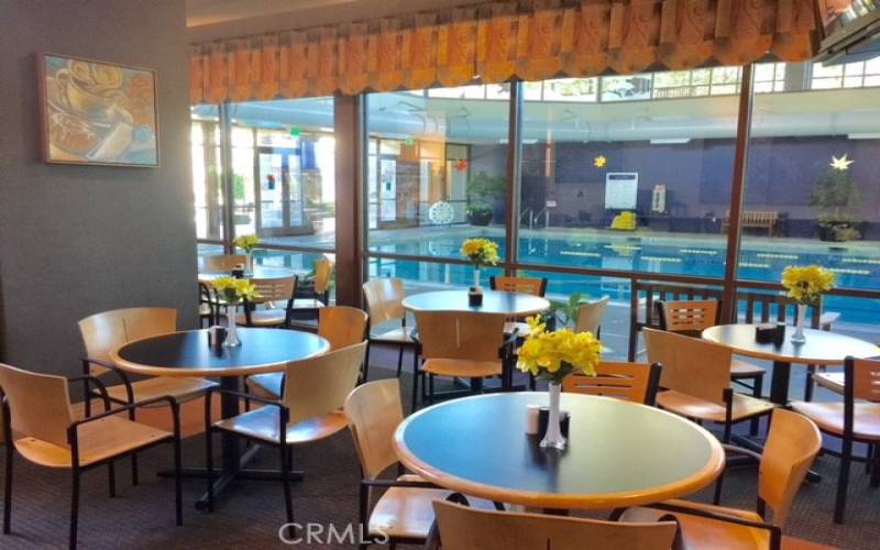 Friendly Trilogy Meeting Area inside the Sports Club; view toward the Indoor Pool.