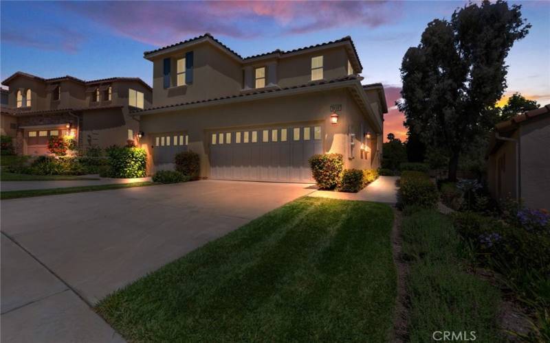 Evening view of  this Beautiful Upper Senior Trilogy Condo. Private entry is from right side, downstairs neighbor entry is from left-side.