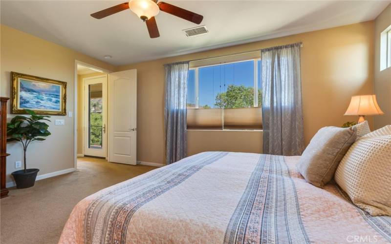 Spacious Primary Bedroom - lighting is controlled via rolled window covering