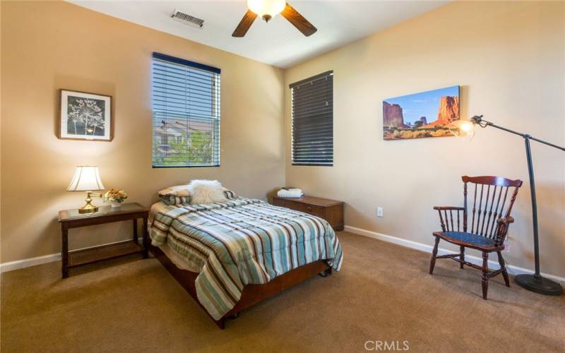 Front-facing Guest Bedroom has attractive Fan/Light to control climate and room lighting